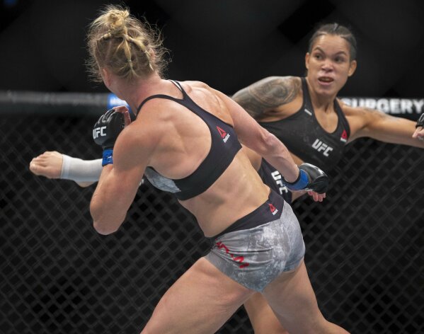 Amanda Nunes wins big Jon Jones squeaks decision at UFC 239 AP News